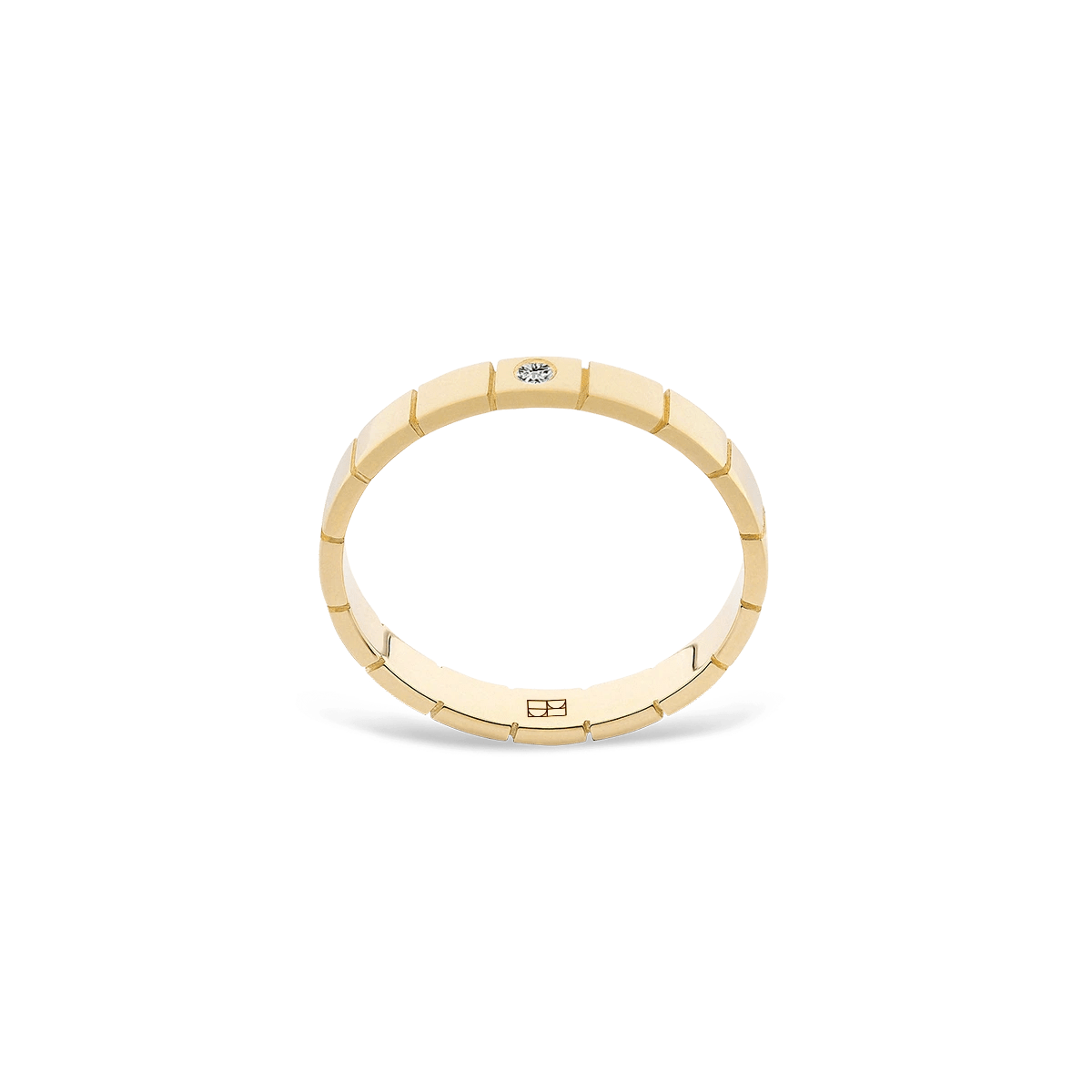 Elegancka obrączka ślubna 18k BELLER z unikalnym designem inspirowanym geometrycznymi formami, ozdobiona lśniącym brylantem, biżuteria Kraków.
